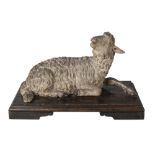 A Continental painted terracotta model of a lamb, probably Italian, 18th century, naturalistically