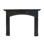 An English Baroque style bolection chimneypiece, Belgian black marble, circa. 1890's, with a slow