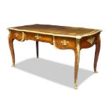 A Louis XV style gilt metal mounted kingwood and cross banded serpentine bureau plat, second half