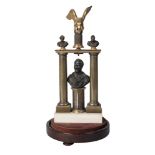 A Regency bronze and marble watch stand, of architectural form, with two columns mounted with an