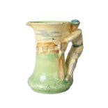 A Burleighware jug, 20th century, the handle in the form of Don Bradman with cricket bat and pads,