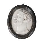 An Italian Carrara marble oval portrait relief of a man, believed to be Lucius Domitius Ahenobarbus,