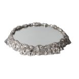 An Elkington & Co. silver plated and mirror table plateau, 1854, of circular form, moulded with