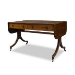 A Regency mahogany and boxwood strung sofa table, the drop leaf top with two frieze drawers and