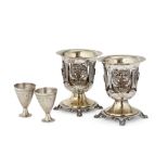 A pair of Ottoman silver spoon holders and egg cups, Egypt, 19th century, the first of vase form