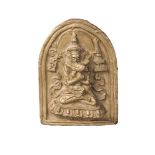 A Tibetan gilt terracotta votive plaque of Samvara, 19th century, depicted with consort in vab-