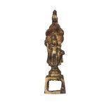 A Chinese gilt bronze miniature figure of Guanyin, Tang dynasty, 8th century, standing on