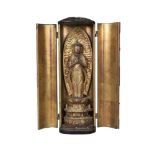 A Japanese lacquered and gilt wood Zushi shrine, 18th century, the pair of doors enclosing Buddha