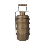 A Tibetan brass travelling food container, 19th century, of cylindrical form, with five stacking