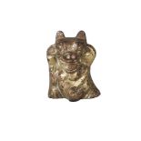 A Chinese gilt bronze fitting, Han dynasty, modelled as a bear, standing with paws held aloft and