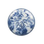 A large Japanese charger, early 20th century, painted in underglaze blue with a pine tree in an