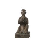 A Nepalese bronze kneeling figure, 19th century, with hands clasped, on square base, 10cm high