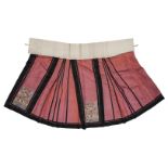 A Chinese kesi silk embroidered skirt, late Qing dynasty, decorated with roundels of phoenix on a