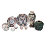 Ten pieces of Oriental pottery, 18th-20th century, comprising a famille rose jar, a famille rose