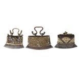 Three Tibetan brass and studded leather tinder pouches, 19th century, one with embossed brass mounts