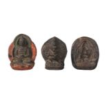 Two Tibetan votive terracotta plaques and a terracotta mould of a stupa, 18th/19th century, one