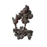 A Japanese rootwood carving of a traveller with a chicken, late 19th century, carved with right