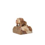 A Chinese soapstone square seal, early 19th century, carved with a seated Buddhist lion, 5.7cm wide,