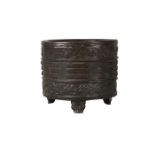 A Chinese bronze 'bagua' censer, Ming dynasty, 16th/17th century, of cylindrical form, cast with the