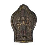 A Tibetan painted terracotta votive plaque, 19th century, depicting Ekadashalokeshvara, 25 x 17cm