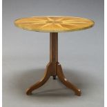 A circular rosewood and birdseye maple marquetry inlaid tilt top occasional table, 19th Century