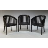 A set of three black painted Italian tub armchairs, late 20th Century, with slatted backrest and