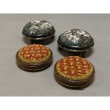 A pair of Victorian ebonised and gilt metal mounted footstools, of circular form, the glass bead