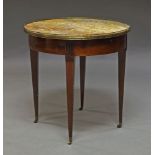 A Louis XVI style mahogany bouillotte table, late 19th Century, the circular marble top with brass