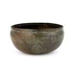 An engraved high tin bronze bowl, Ghaznavid, Iran, 12th century, of deep form, with inscription