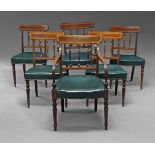 A set of Edwardian mahogany and satinwood banded dining chairs, with turned reeded upright rails,