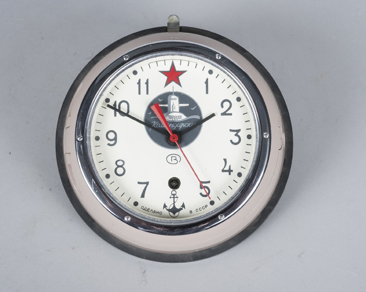 A 'Cold War' period Russian Soviet Submarine clock, by the Vostok factory, Christopol, the cream