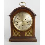 An Edwardian mahogany eight-day Regency style bracket clock, with brass carrying handle, the body