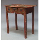 A Chinese red painted and parcel gilt desk, 19th Century, the rectangular top depicting figures in a