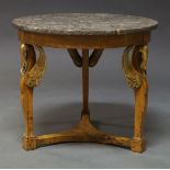 A French beech wood and parcel gilt gueridon, 19th Century, with grey circular marble top, on carved