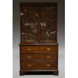 A Victorian mahogany secretaire bookcase, the moulded cornice above two astragal glazed doors,