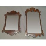 A George III style mahogany mirror, with shaped cresting and shell motif, of rectangular form with