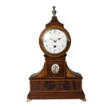 An Edwardian Sheraton style mahogany and satinwood inlaid drum shape clock, late 19th/early 20th