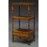 A Victorian rosewood three tier whatnot, the top surmount with three quarter brass gallery, on