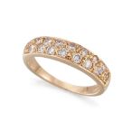 An 18ct. gold, coloured diamond ring, of half-hoop design pave-set with circular-cut pink