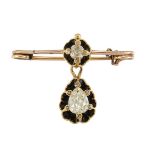 A 19th century diamond and black enamel pendant brooch, composed of a single old-brilliant-cut