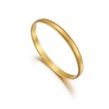 A 22ct. gold bangle, inner circumference 5.8cm, London hallmarks, 1993, approximate weight, 33.9g