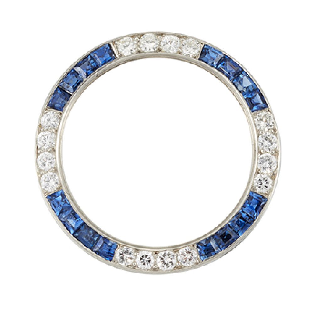 An Art Deco, diamond and sapphire brooch, in form of an openwork hoop set alternately with