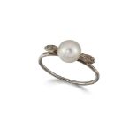 A diamond & pearl ring, the central cusp-mounted bouton pearl with old-brillaint-cut diamond three