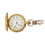 An 18ct. gold hunter case centre seconds stopwatch and a 9ct gold watch chain and fob, the pocket