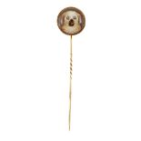 A late 19th century gold, reverse-painted crystal intaglio stickpin, the circular domed crystal