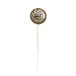A late 19th century gold, reverse-painted crystal intaglio stickpin, the circular domed rock crystal