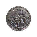 A continental silver circular box, 17th/18th century, relief cast with figures, enclosing sixteen