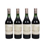 Four bottles of Chateau Haut Brion 1982, ullages to high shoulder, low neck, seals good, minor