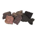 A collection of twenty carved wooden Indian printing blocks, of traditional intricate floral and