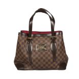 A Louis Vuitton Damier handbag, two adjustable straps and gilt metal hardware 34cm wide, with dust